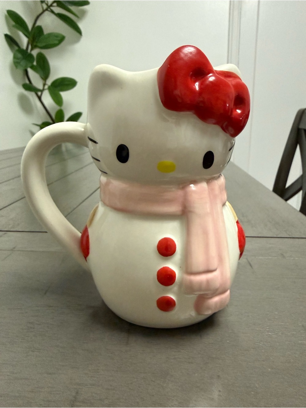 Sanrio White Ceramic Hello Kitty Snowman Mug with Red Bow and Pink Scarf